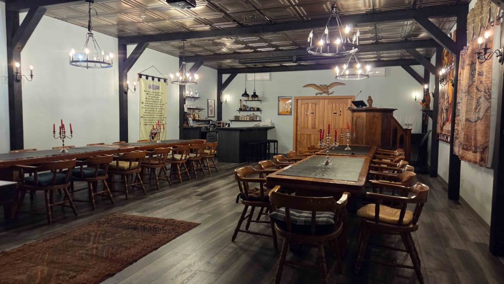 The unique Grey Whale Castle event venue in San Diego with bar, pulpit, and banquet tables